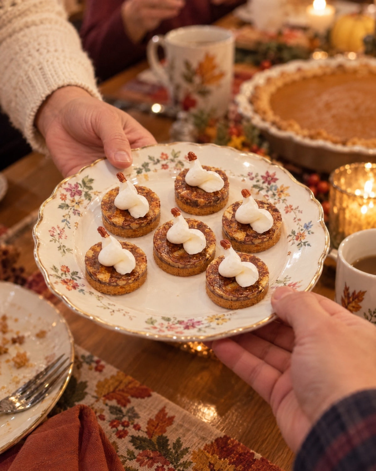 Mini pecan pies passed around a family table
